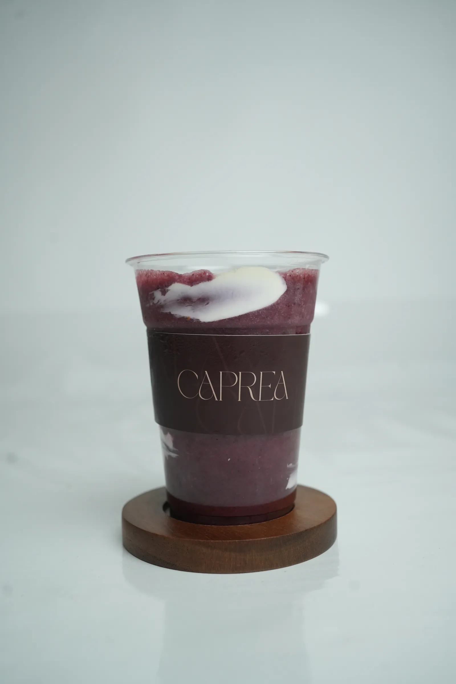 Acai smoothie on a wooden stand